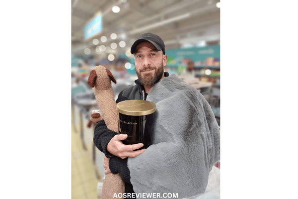 Posing proudly with the candle at ALDI